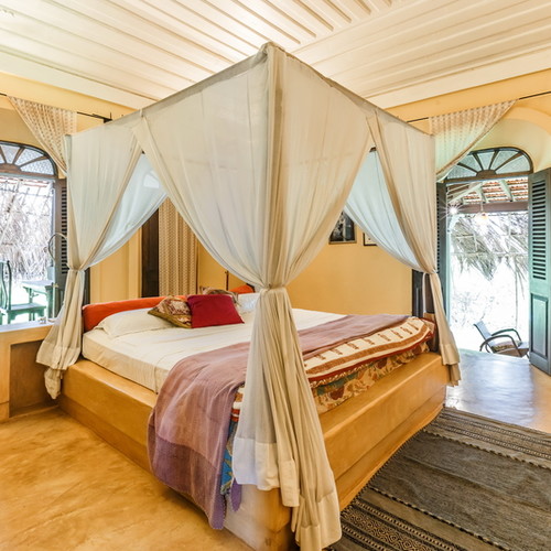 Luxury bedroom in villa with pool